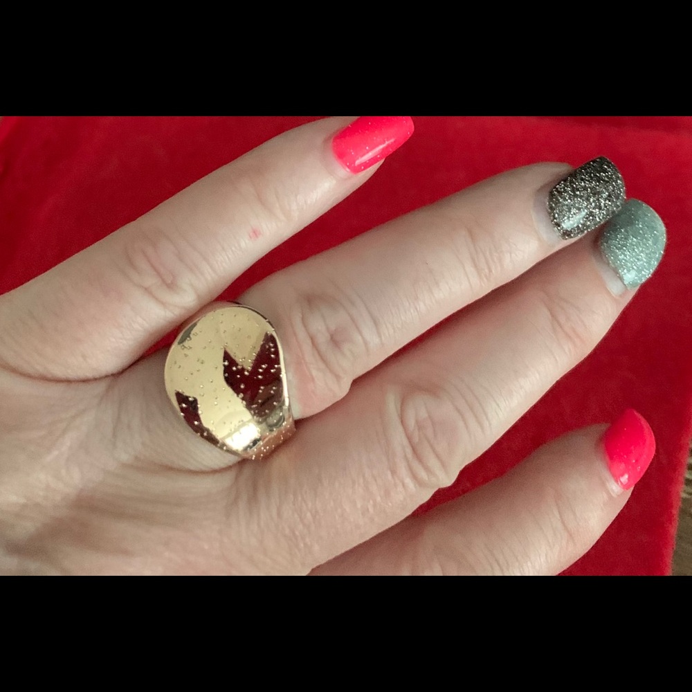 Sterling Silver ring with gold center. Size 7